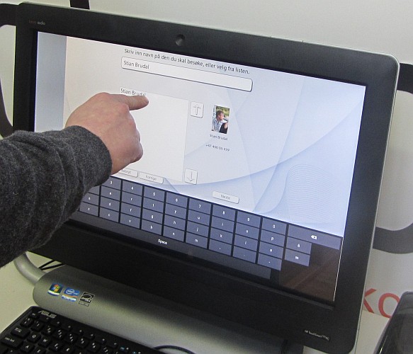 Infokiosk for onVisit besøksregistrering tett integrert med tidBANK